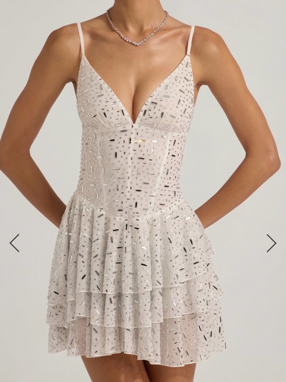 Oh Polly Orren

Embellished Ruffled Tiered Mini Dress in White